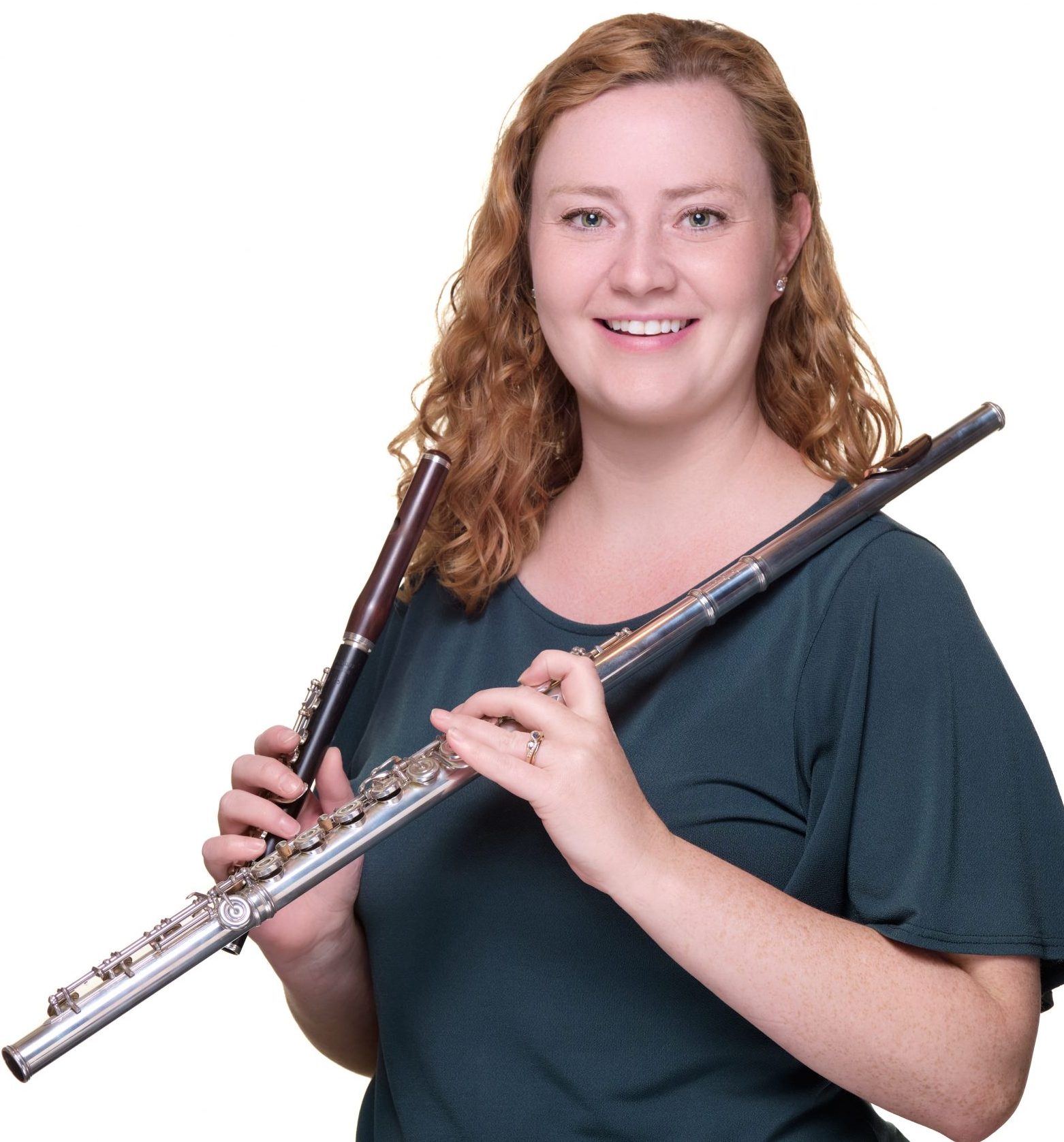 Sorcha holding a piccolo and flute